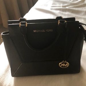 Michael kids purses black barley used great condition